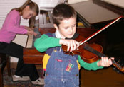 A piano and violin duet at Newton Music Academy
