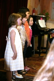 Kids use keyboards at Newton Music Academy