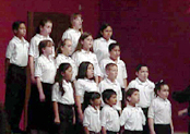 Kids use keyboards at Newton Music Academy